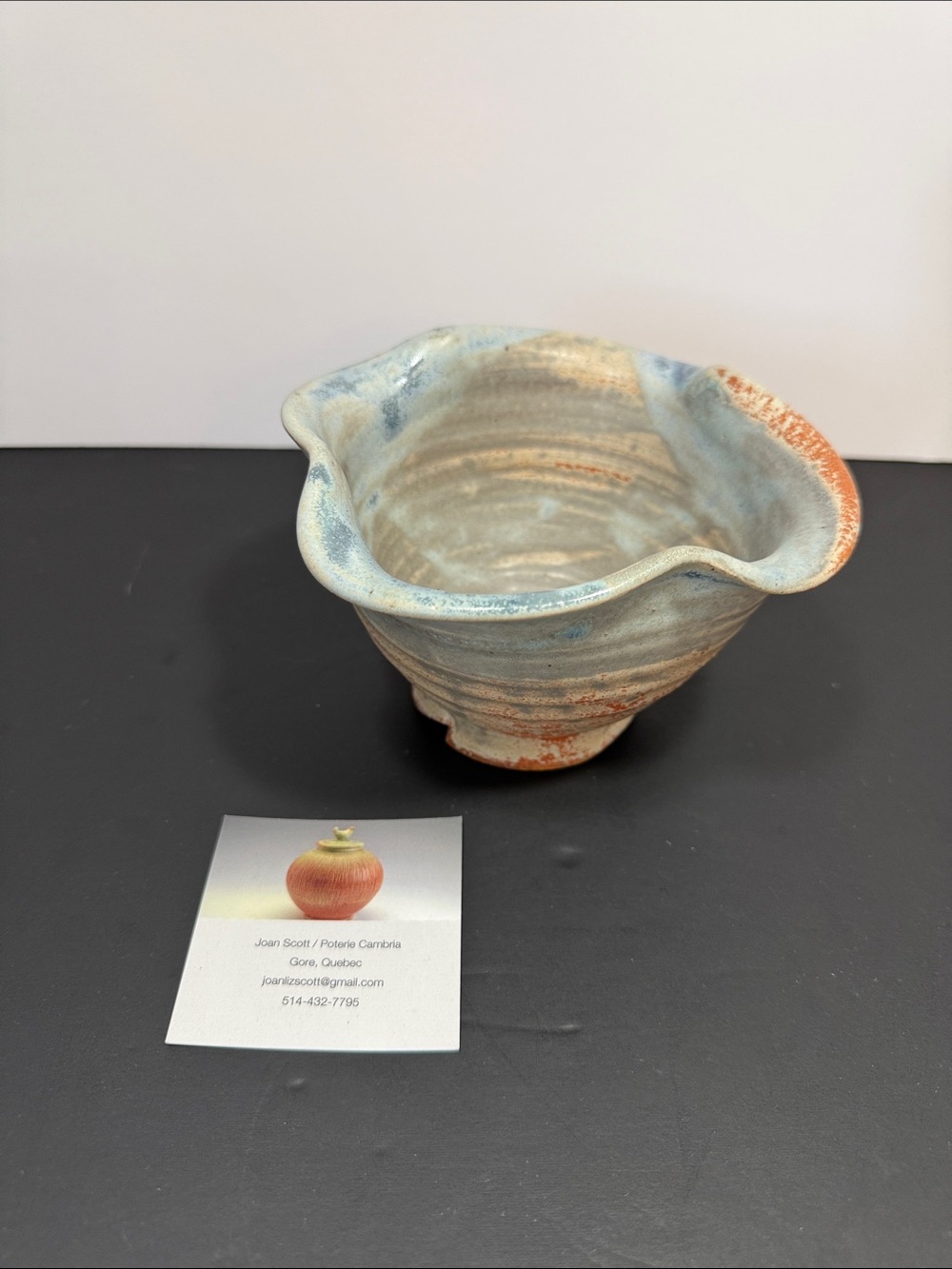 Handcrafted Ceramic Bowl in Soft Blue and Rust Accents